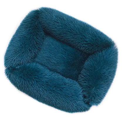 Comfortable and stylish Plush Pet Bed in soft teal color, ideal for pets to relax and sleep.